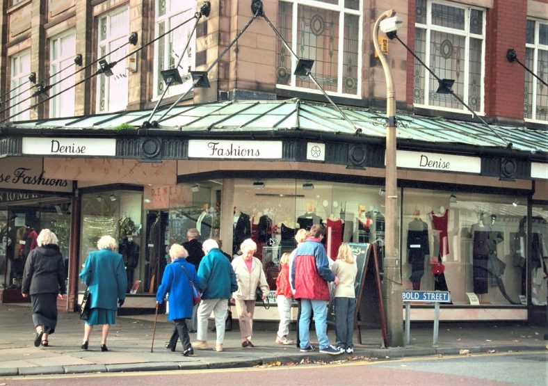 The building on the corner of Bold Street and Lord Street is one of the few in Southport with a suspended verandah - supported by lions. You'll see a similar arrangement on Nevill Street. This photo dates from 1999. | Historic England
