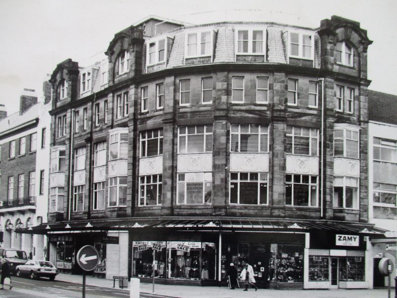 The corner of Coronation Walk and Lord Street in around 1980. These buildings are typical of Lord Street - rebuilt in the early 1900s with shops below and offices or flats above. | Sefton Libraries